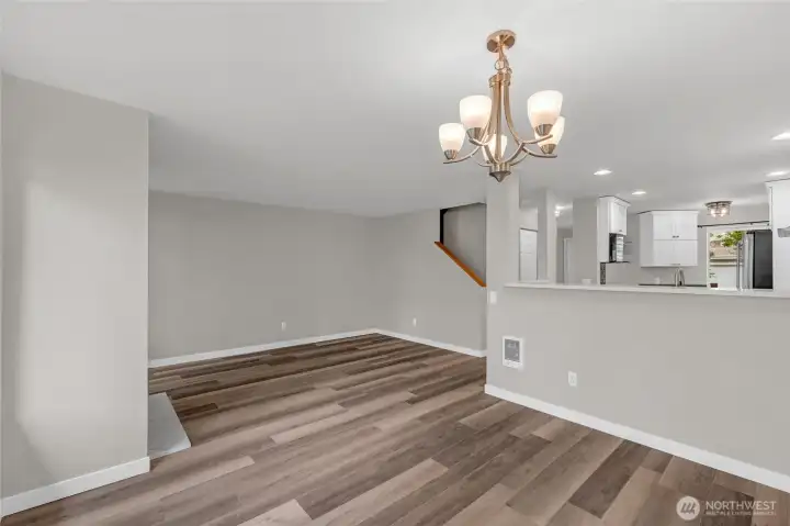 Dining area positioned perfectly between kitchen and living room.