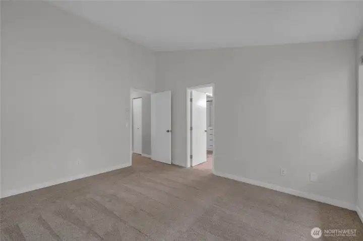 Well-appointed primary suite designed for comfort and ease.