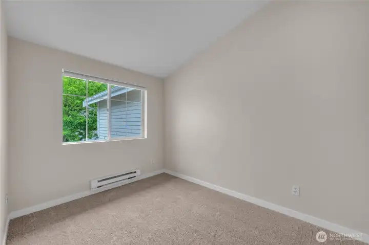 Additional bedroom offering flexibility for guests or office use.