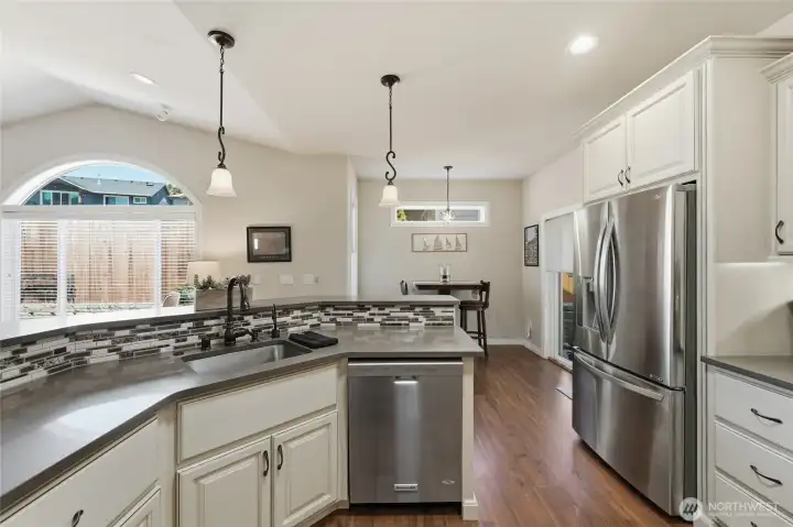 Extensive cabinetry and pantry storage provide exceptional organization for cooking enthusiasts.