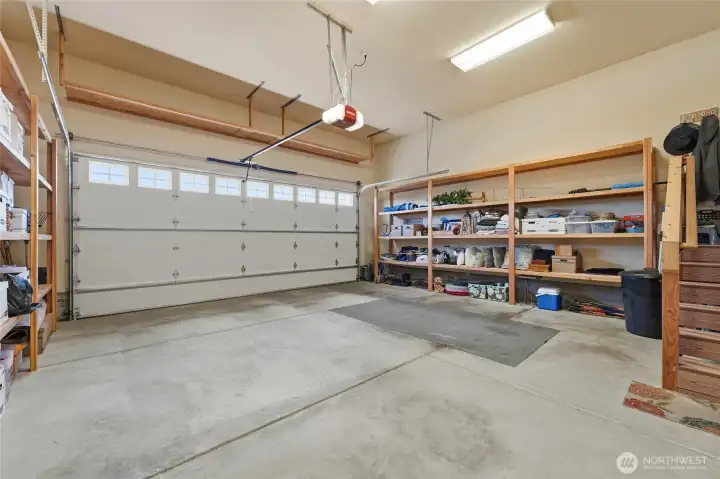 Rare oversized garage with exceptional storage capacity and room for recreational gear.