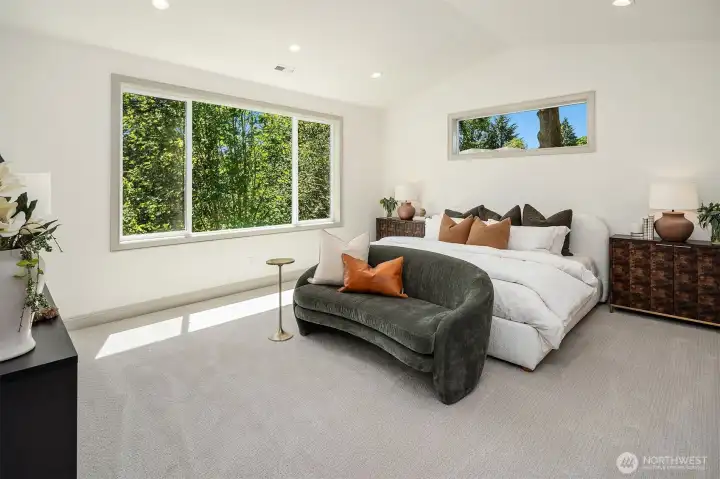 Designer primary suite with five-piece bath & heated floors