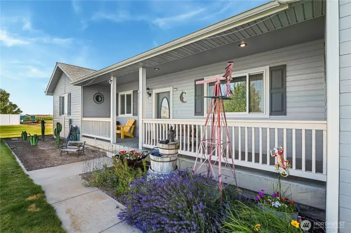 Covered front porch with peaceful views of the surrounding countryside.