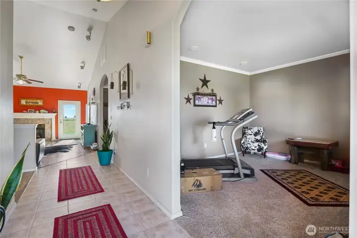 Enter into a thoughtfully designed layout with spacious living areas beyond.
