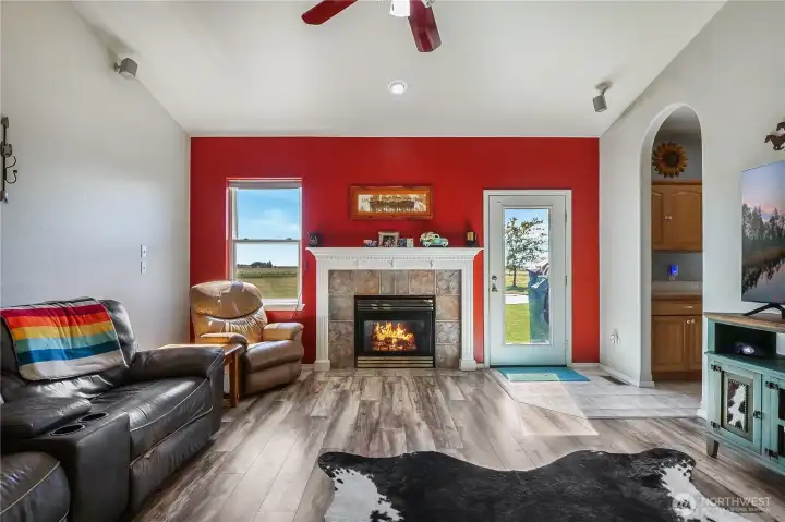 Cozy propane fireplace creates a warm focal point.
