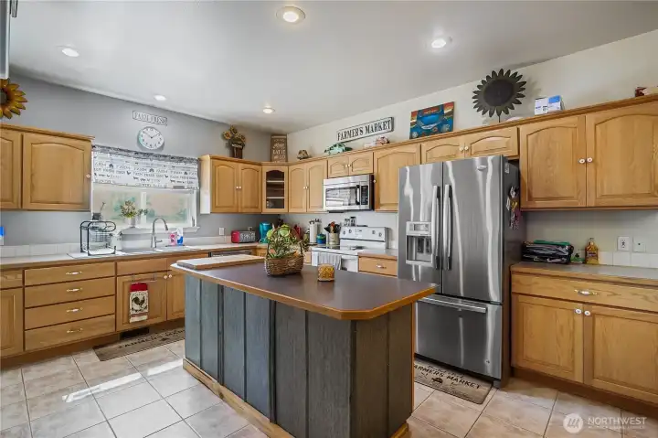 Ample cabinet storage and generous counter space.