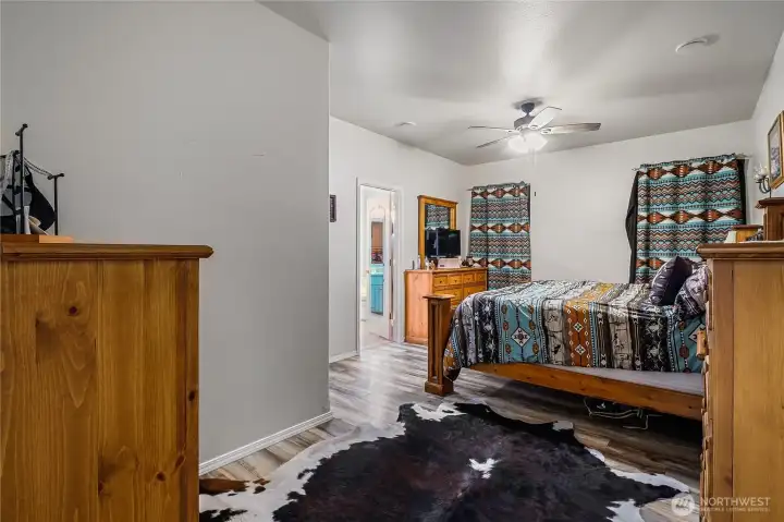 Spacious primary suite offers a quiet retreat.