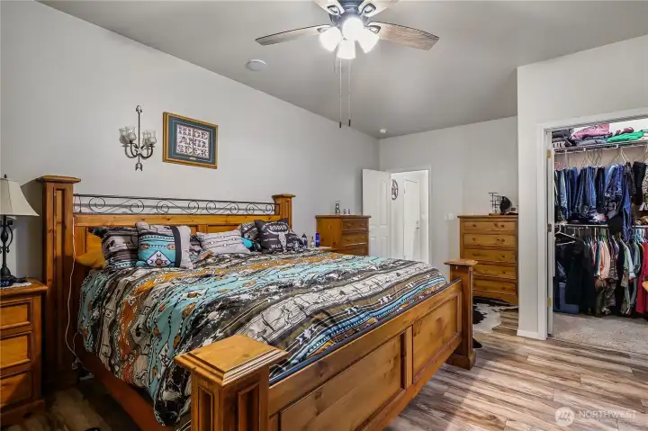 Relax in the generously sized primary bedroom.