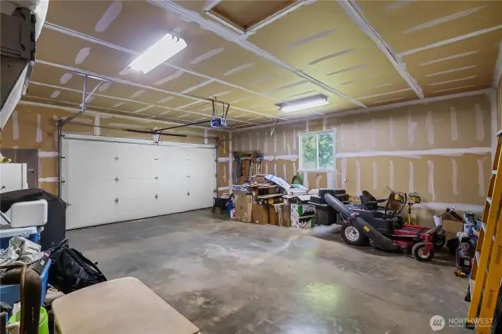 Attached two-car garage with room for storage.