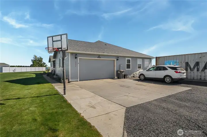 Convenient attached garage provides everyday functionality.