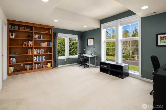 The  beautiful upstairs library room / could be used as a game room or recreation room too.
