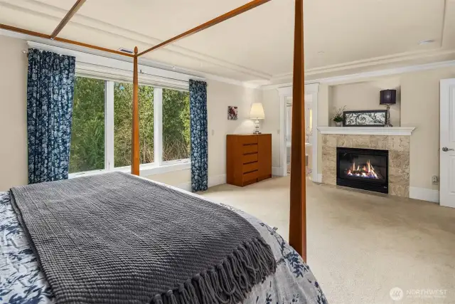 A lovely gas fireplace in the master bedroom suite