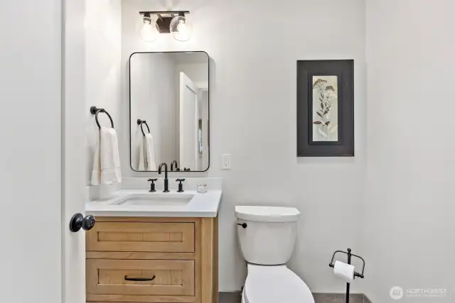 Down the hall you will find an updated half bath.