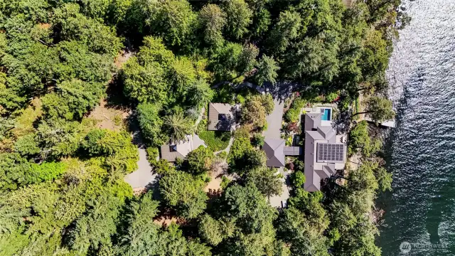The main home, guesthouse and bunkhouse are positioned on this park-like property to ensure each of the structures possesses breathtaking views.