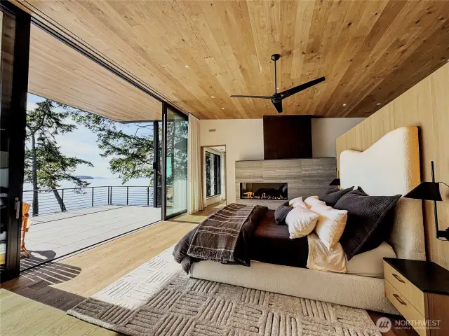 The primary bedroom suite with personal deck and incredible views