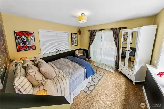 Lower suite Bedroom with slider to back patio
