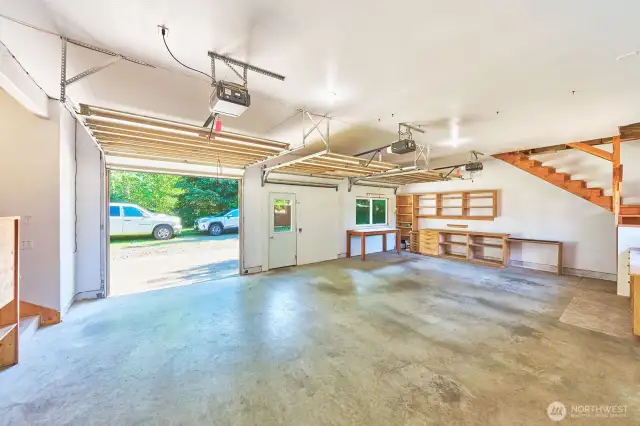 Versatile 704 sq ft studio workspace converted from an attached garage—complete with a large storage area above.