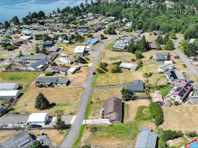 Check that out! Super nice rectangular lot on the upside of the road
