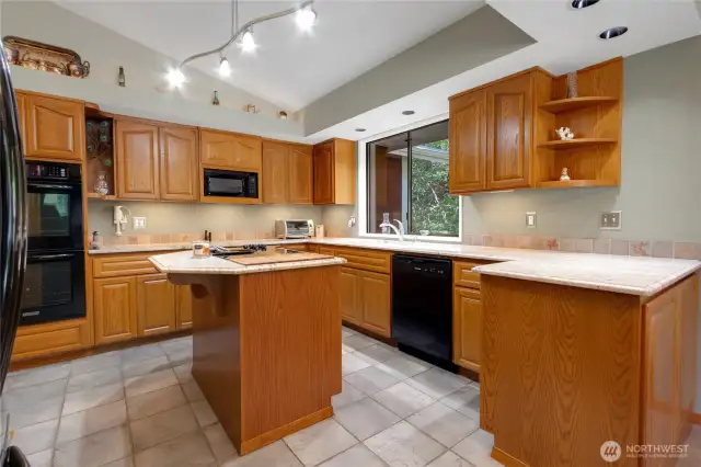 Thoughtful details like pull-out shelving enhance both function and ease of use.
