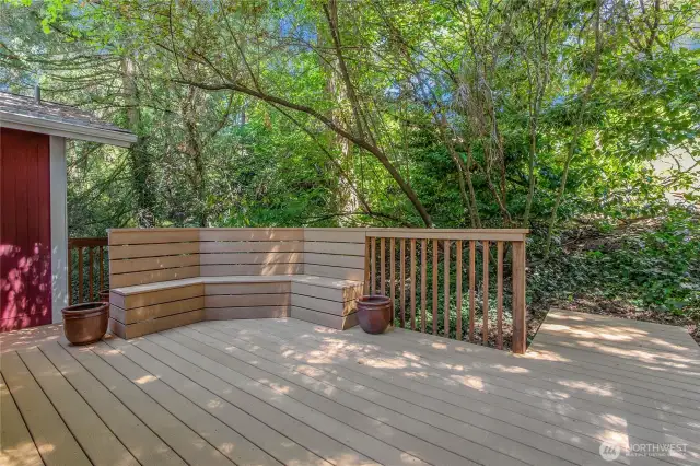 Built-in benches on the kitchen-adjacent back deck make it a perfect place to soak in the beauty of the outdoors.
