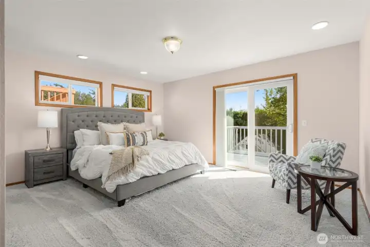 Main level primary retreat with it's own back deck access.