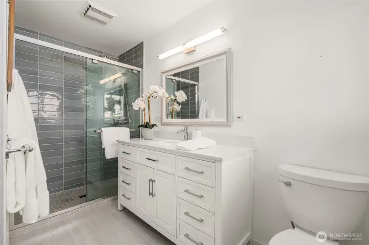 Primary 3/4 bath en suite with heated floors.