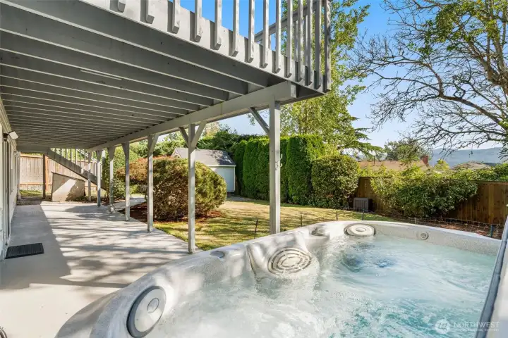 Back yard cross section. Hot tub stays with home.