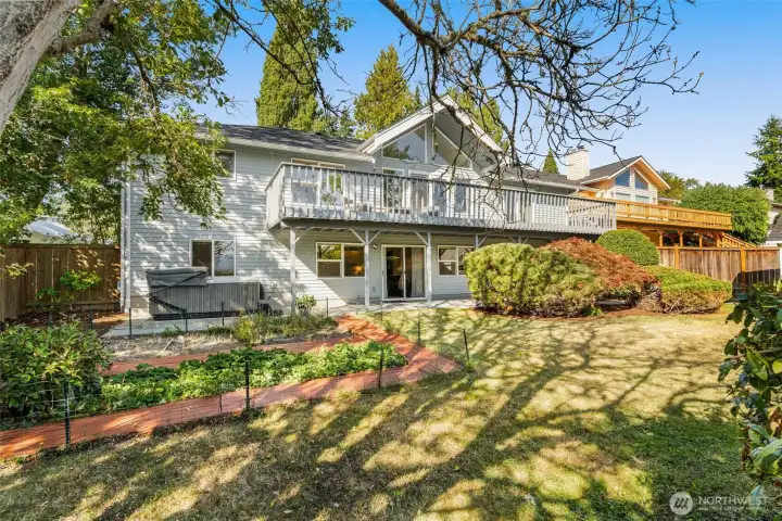 Backyard elevation. Room with work, garden, and play!