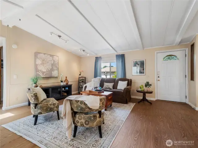 The front door welcomes you into the warm living space.