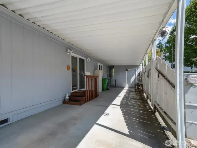 The roomy carport has a charger for electrical vehicles.