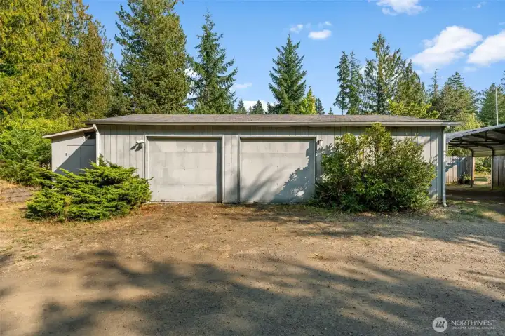 Upper 2 car garage with shop area(was a dark room)