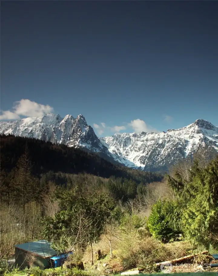 Mount Index (at left) and Mount Persis rise above Heybrook Ridge and the forested valley in this photo taken from above the cantina. A moderate hike begins on the outskirts of Index and climbs to the top of Heybrook Ridge for spacious mountain views. Less than a mile from town is the trailhead for Lake Serene, an alpine beauty backed by the 3,000-foot eastern cliffs of Mount Index.