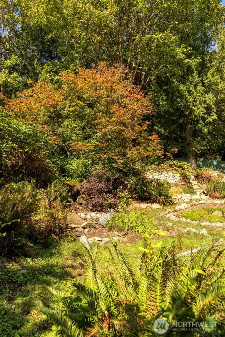 Skyrock garden in fall colors, drawing you into the sitting area.