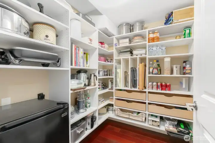 Smart pantry with Claifornia Closet built-ins.