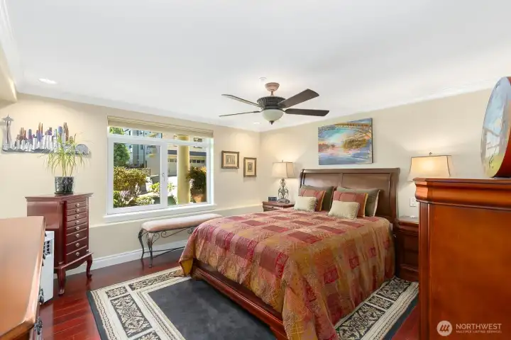 Primary suite w/lux bath & walk-in closet w/California Closet built ins.