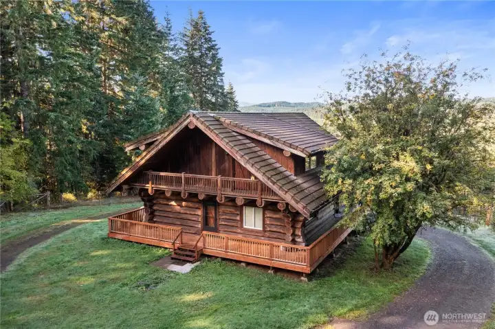 Massive hand hewn logs built this home