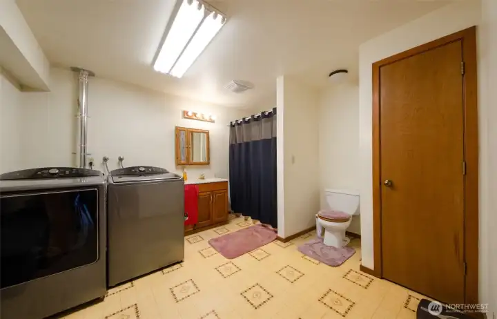 Daylight basement bathroom and laundry