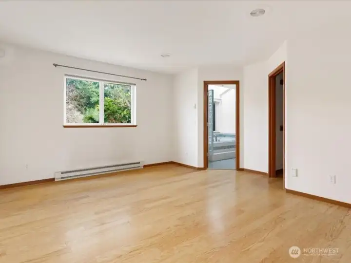 Primary bedroom (unstaged) with walk-in closet