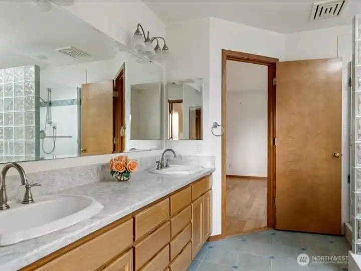 Primary bath with two sinks.