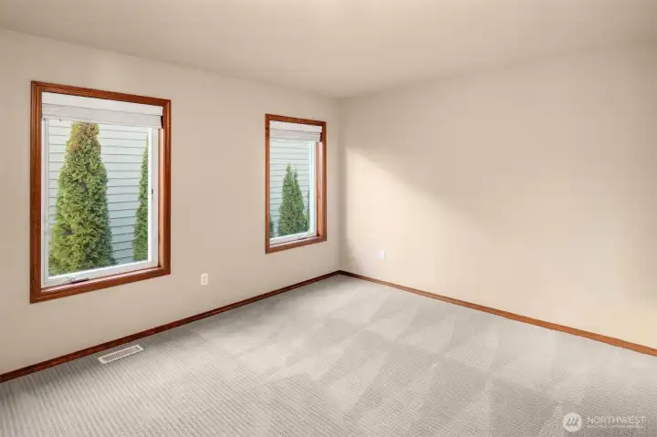 3rd Bedroom offers Milgard casement window, large closet and lush carpet.