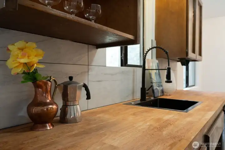 Tile backsplash and new butcher block countertops