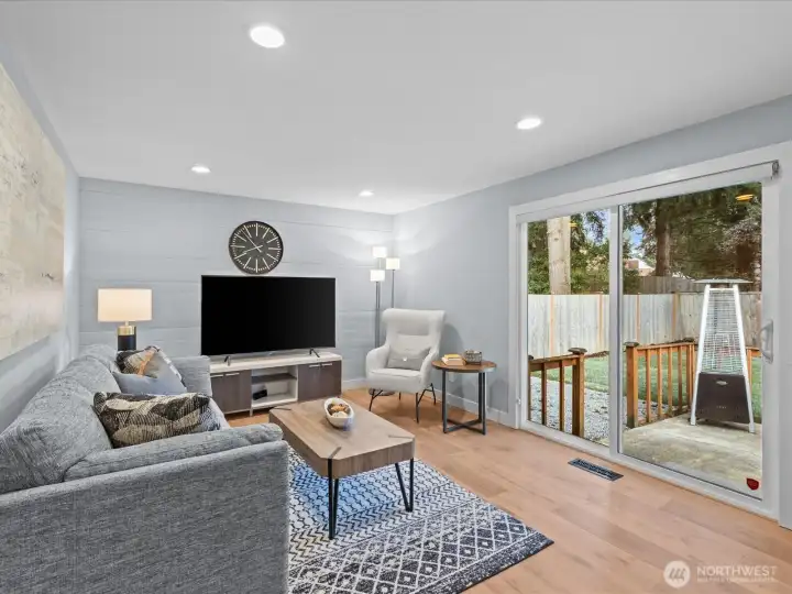 Family room is set up nicely with direct access to park like back yard.