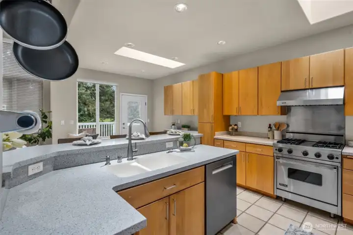Kitchen is beautiful with lots of cabinets