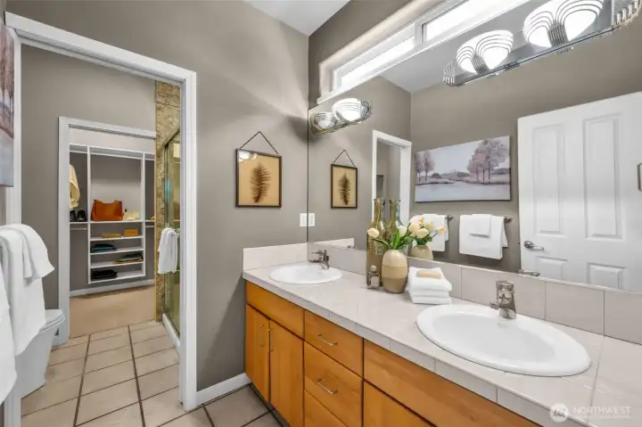 In the Primary bedroom is a large private bathroom with huge closet.