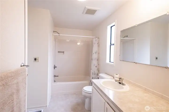 Enjoy privacy and comfort in the primary bathroom