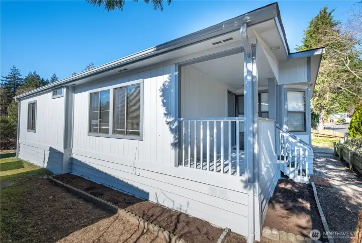 The covered porch is perfect for any weather.