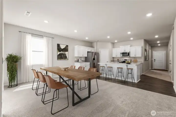 Virtually staged. Laminate flooring through main living spaces of the home. Photos are for representational purposes only. Colors and finishes may vary.