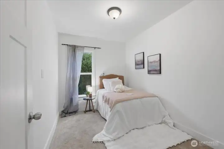 Smallest of the bedrooms. Room for a single bed and dresser. Office is you don't want or need a third bedroom