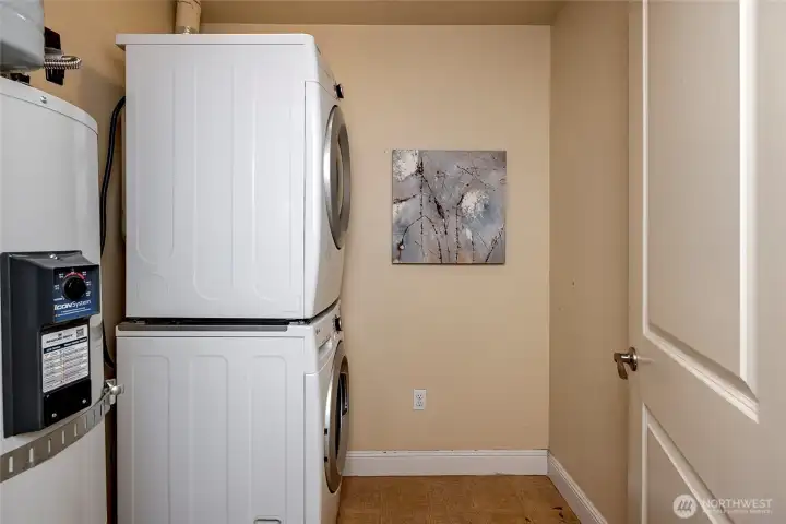 Utility room with W/D and new (2025) water heater