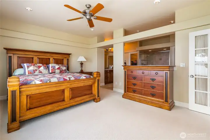 Primary bedroom with attached master bath and walk in closet.